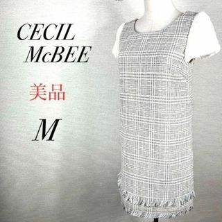 セシルマクビー(CECIL McBEE)の美品　セシルマクビー　異素材フリンジワンピース　ファー　Iライン　チェック柄(ひざ丈ワンピース)