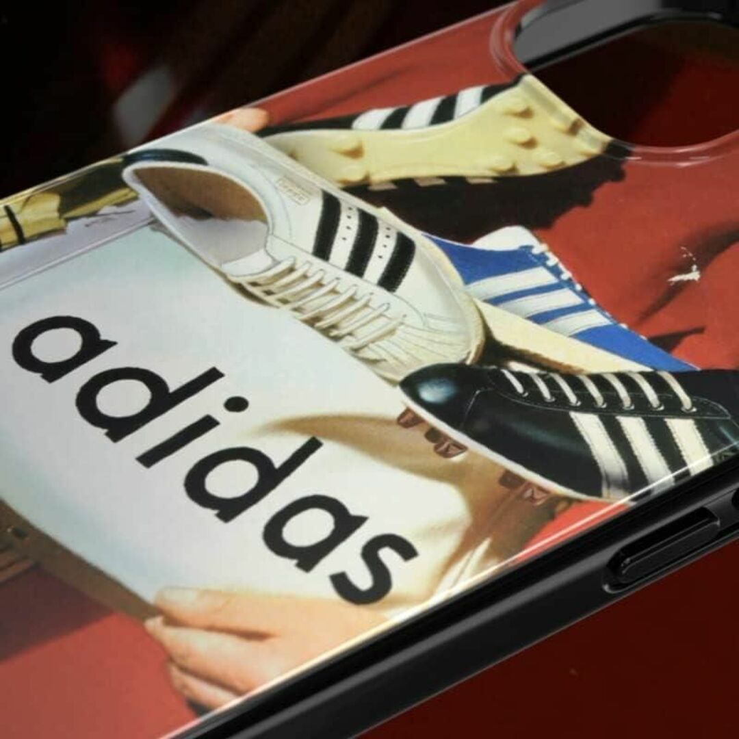 adidas(アディダス)のアディダス 50周年記念 iPhone13用 スマホカバー グラフィックプリント スマホ/家電/カメラのスマホアクセサリー(iPhoneケース)の商品写真