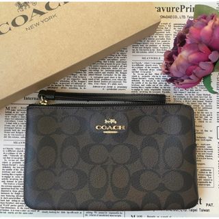 コーチ(COACH)の【新品未使用品】COACH  コーチ  ポーチ   ダークブラウン(ポーチ)