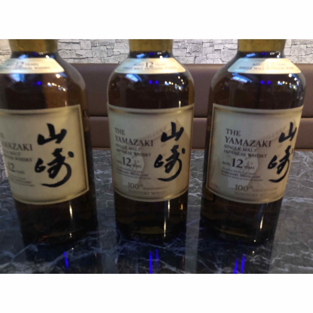 サントリー(サントリー)の値下げ中　山崎12年　100周年記念ラベル　山崎１２年3本700ml 新品 食品/飲料/酒の食品/飲料/酒 その他(その他)の商品写真