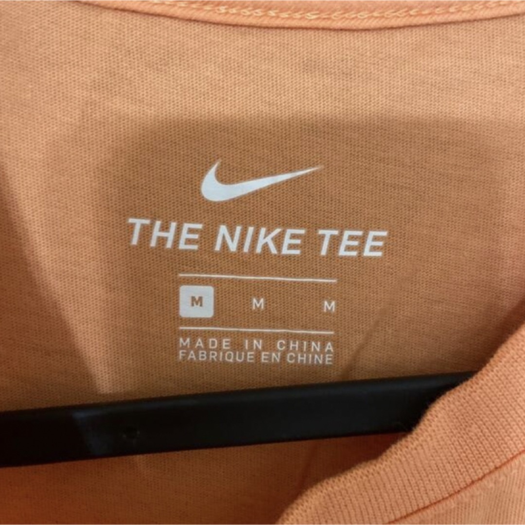 NIKE(ナイキ)のNIKE ナイキ　Tシャツ　オレンジ　半袖　Mサイズ　夏　古着 メンズのトップス(Tシャツ/カットソー(半袖/袖なし))の商品写真