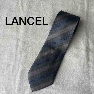 ランセル(LANCEL)の【LANCEL】ネクタイ シルク100% ロゴ入り ストライプ　ブルー(ネクタイ)