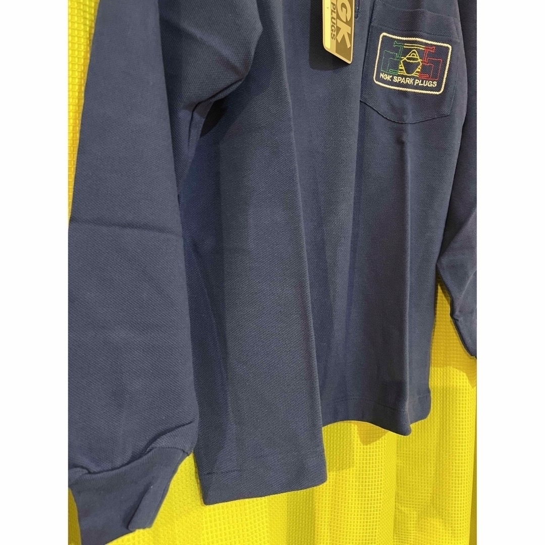 NGK(エヌジーケー)の新品未着用タグ付　NGK 胸ポケット有り　長袖ポロシャツ　日本製　青　Mサイズ メンズのトップス(ポロシャツ)の商品写真