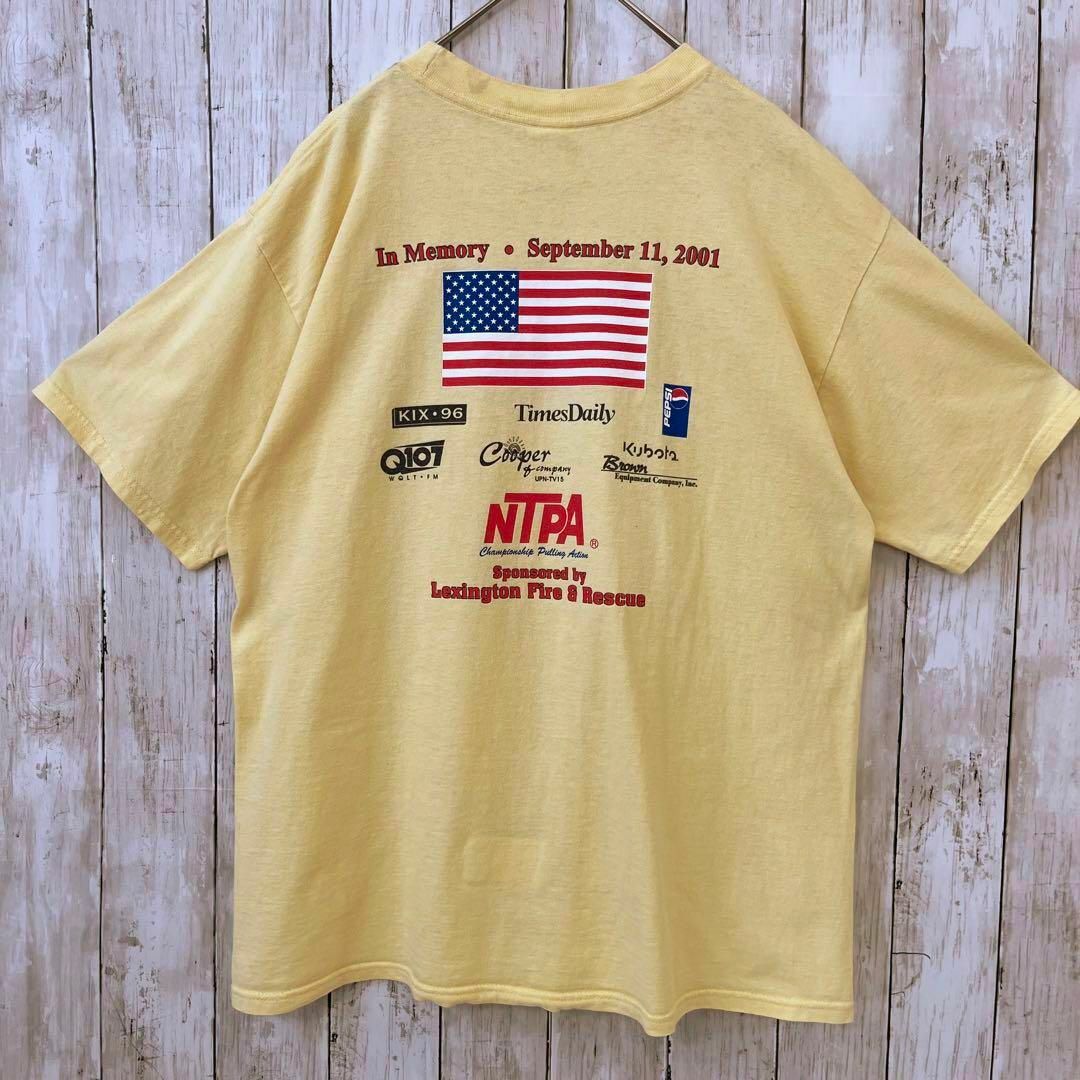 アメリカ古着　メンズ夏物　オーバーサイズバックプリントTシャツ　サイズL 黄色 メンズのトップス(Tシャツ/カットソー(半袖/袖なし))の商品写真