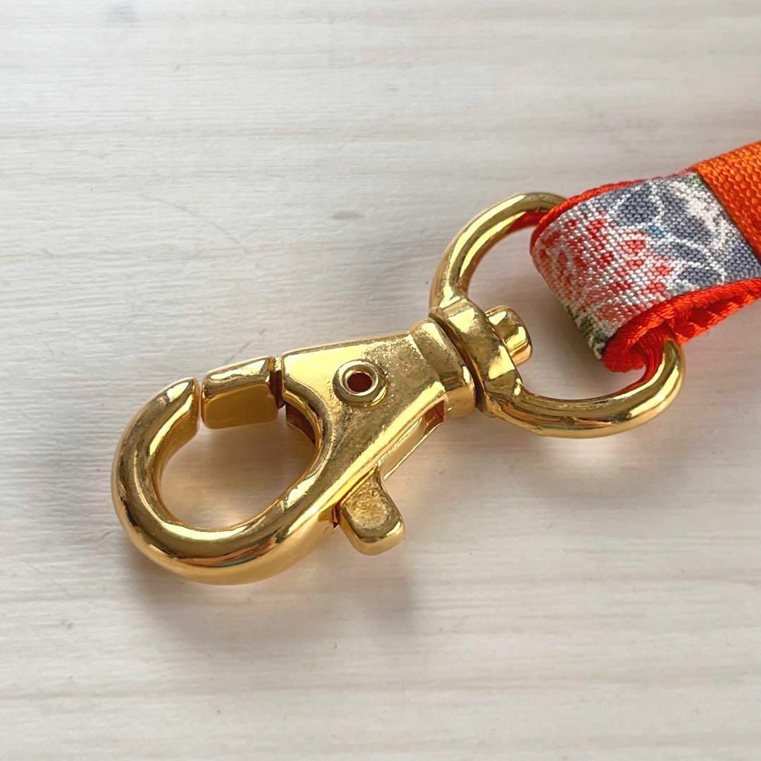 和柄　バッグストラップ　チャーム　ゴールドナスカン　オレンジ ハンドメイドのファッション小物(バッグチャーム)の商品写真