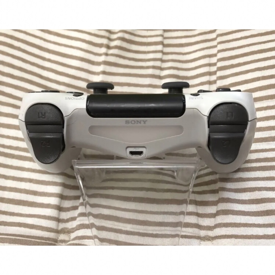 PlayStation4(プレイステーション4)のPS4コントローラー　純正品　グレイシャーホワイト　動作品　ZCT2J エンタメ/ホビーのゲームソフト/ゲーム機本体(その他)の商品写真