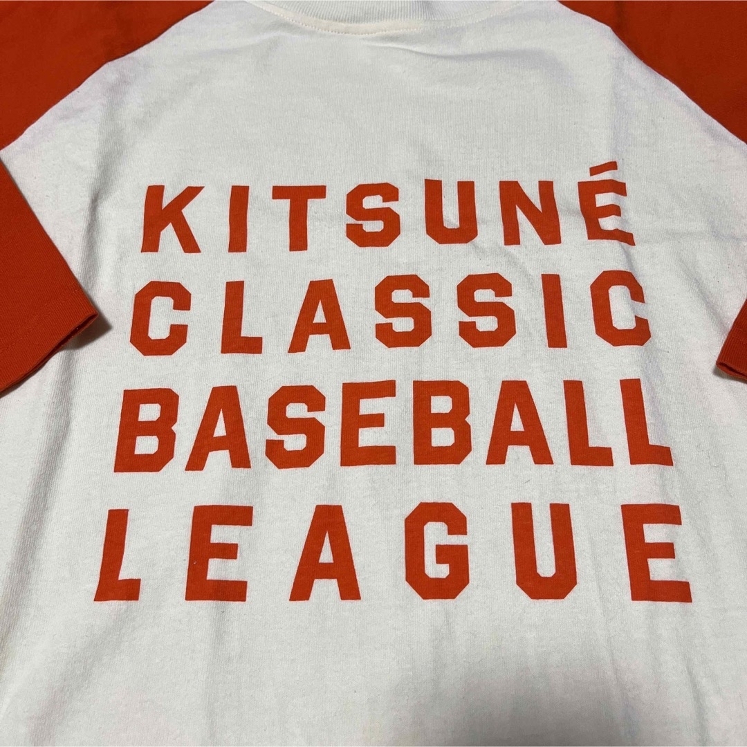 MAISON KITSUNE'(メゾンキツネ)のReebok×MAISON KITSUNE ラグランT オレンジ レディースのトップス(Tシャツ(半袖/袖なし))の商品写真