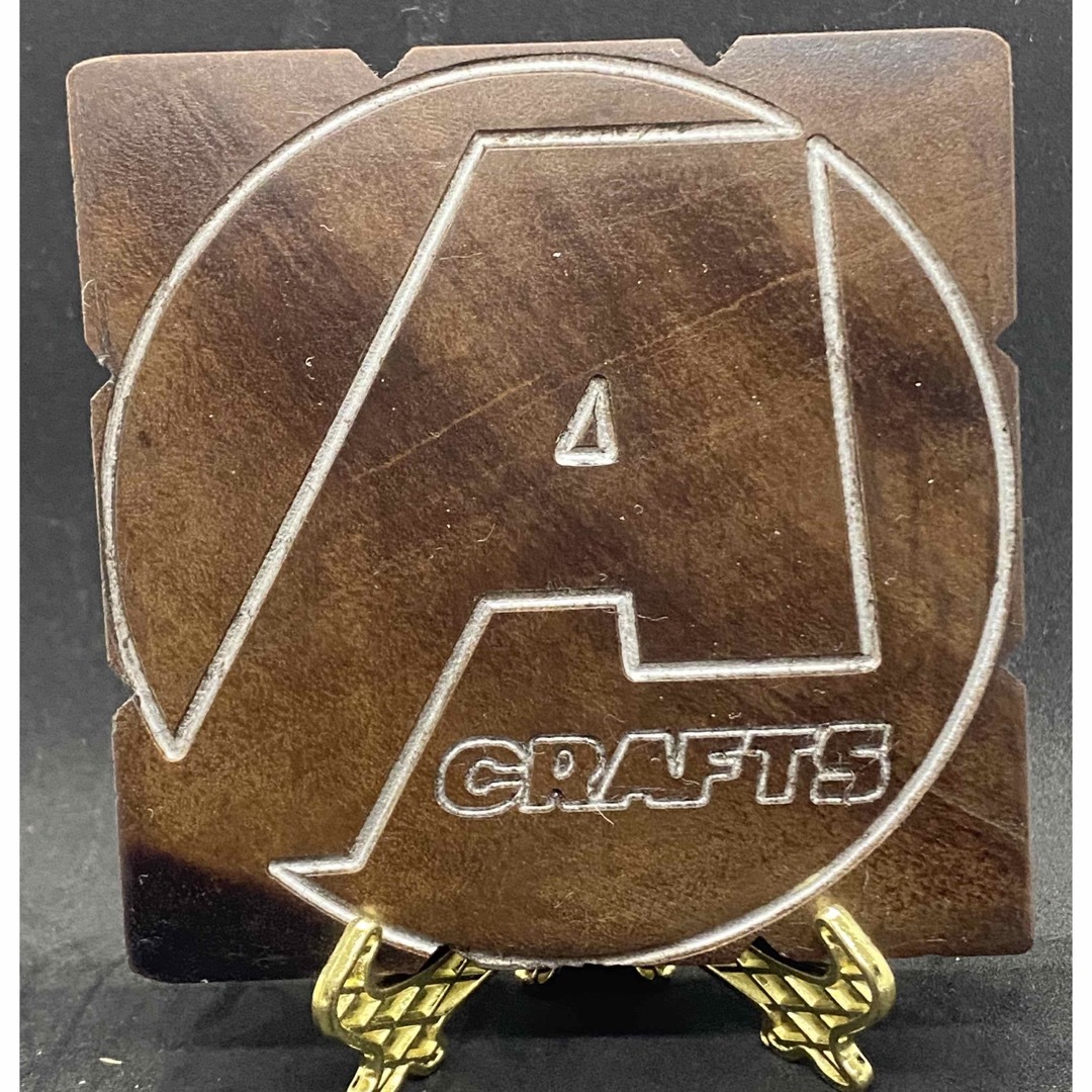 asimocrafts ロゴ 木彫り(シルバー文字墨入れ) スポーツ/アウトドアのアウトドア(その他)の商品写真