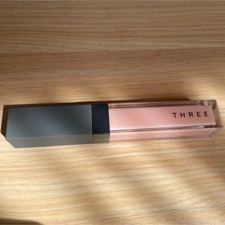 スリー(THREE)のthree シマリングリップジャム21(リップグロス)