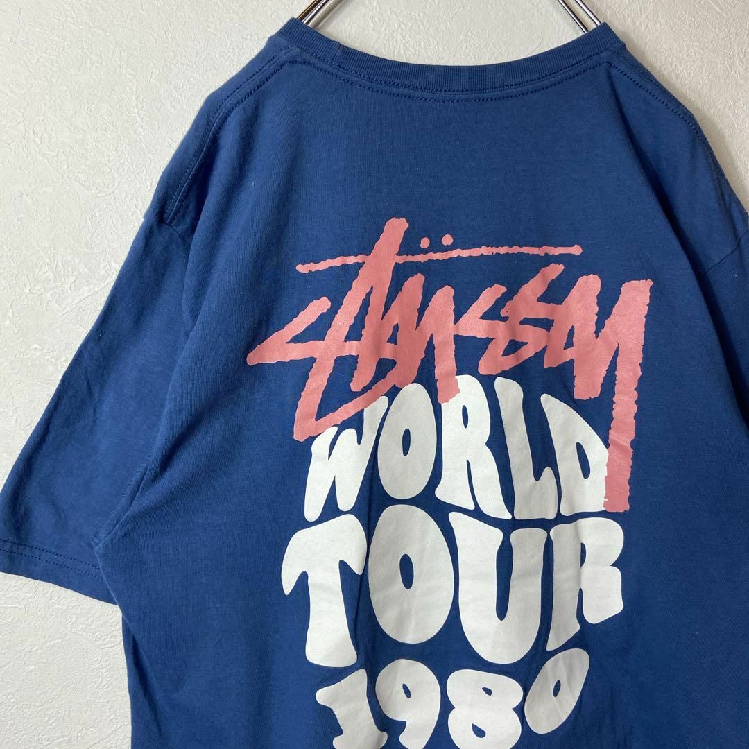 ワールドツアー、両面プリントロゴTシャツ◎】stussyくすみブルー青M