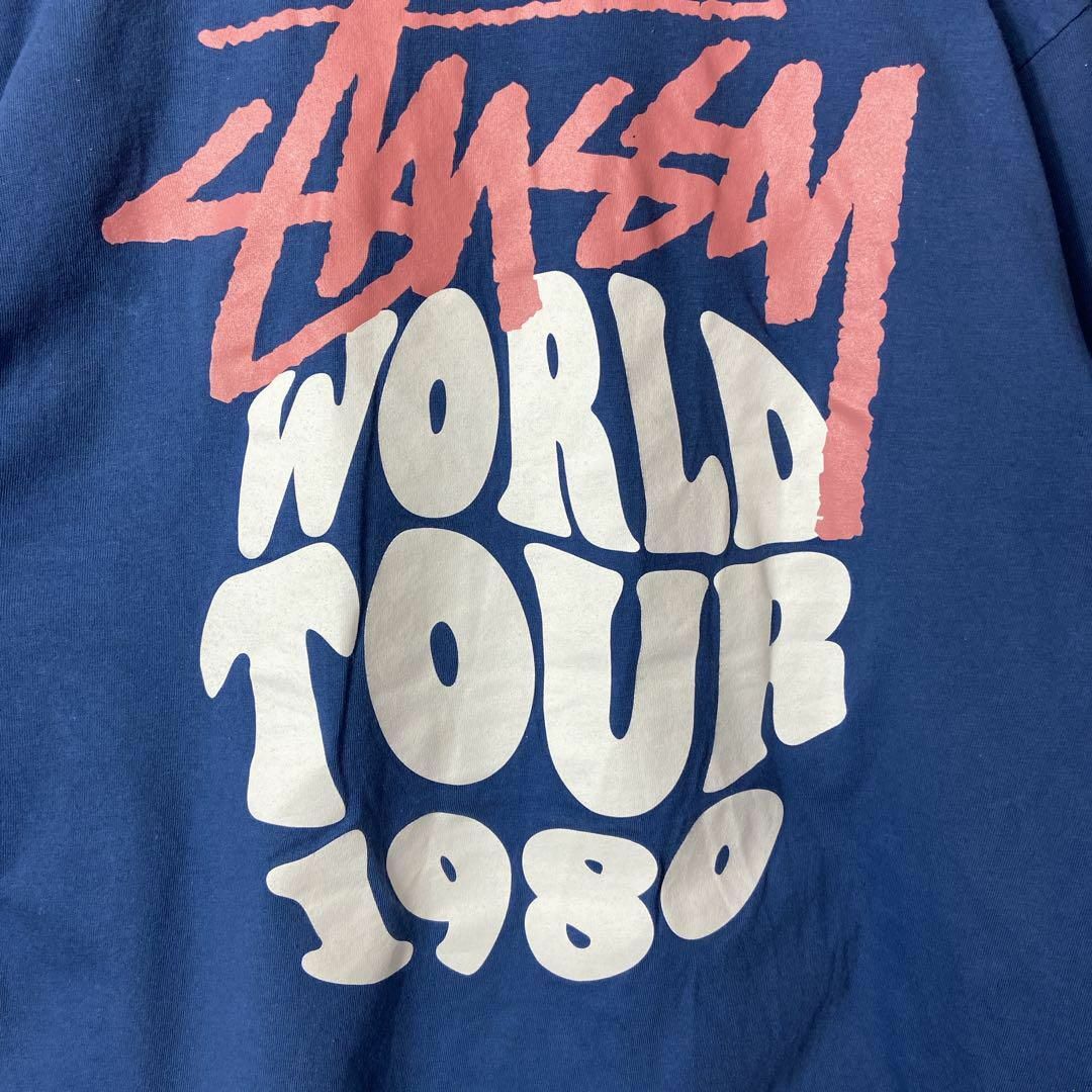 ワールドツアー、両面プリントロゴTシャツ◎】stussyくすみブルー青M