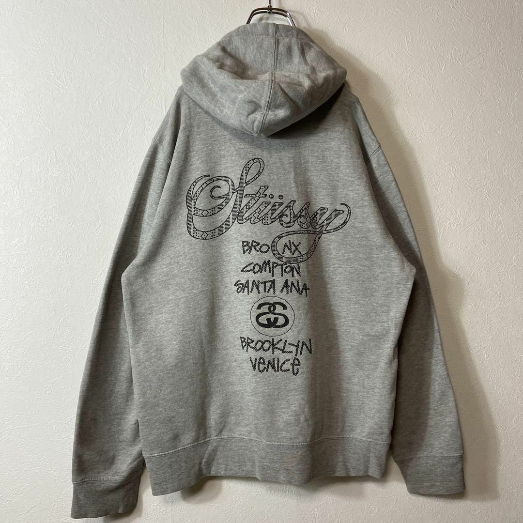 ステューシー WORLD TOUR ZIP HOODIE グレー パーカー L◆