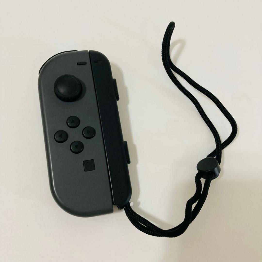 Nintendo Switch(ニンテンドースイッチ)の純正 ニンテンドースイッチ ジョイコン(L) グレー 左　ジョイコンストラップ付 エンタメ/ホビーのゲームソフト/ゲーム機本体(家庭用ゲーム機本体)の商品写真