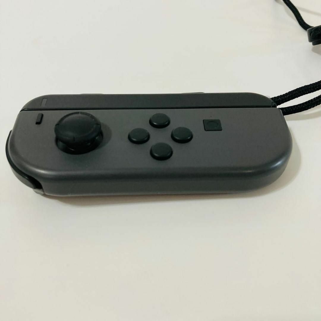 Nintendo Switch(ニンテンドースイッチ)の純正 ニンテンドースイッチ ジョイコン(L) グレー 左　ジョイコンストラップ付 エンタメ/ホビーのゲームソフト/ゲーム機本体(家庭用ゲーム機本体)の商品写真