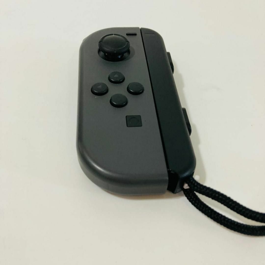 Nintendo Switch(ニンテンドースイッチ)の純正 ニンテンドースイッチ ジョイコン(L) グレー 左　ジョイコンストラップ付 エンタメ/ホビーのゲームソフト/ゲーム機本体(家庭用ゲーム機本体)の商品写真