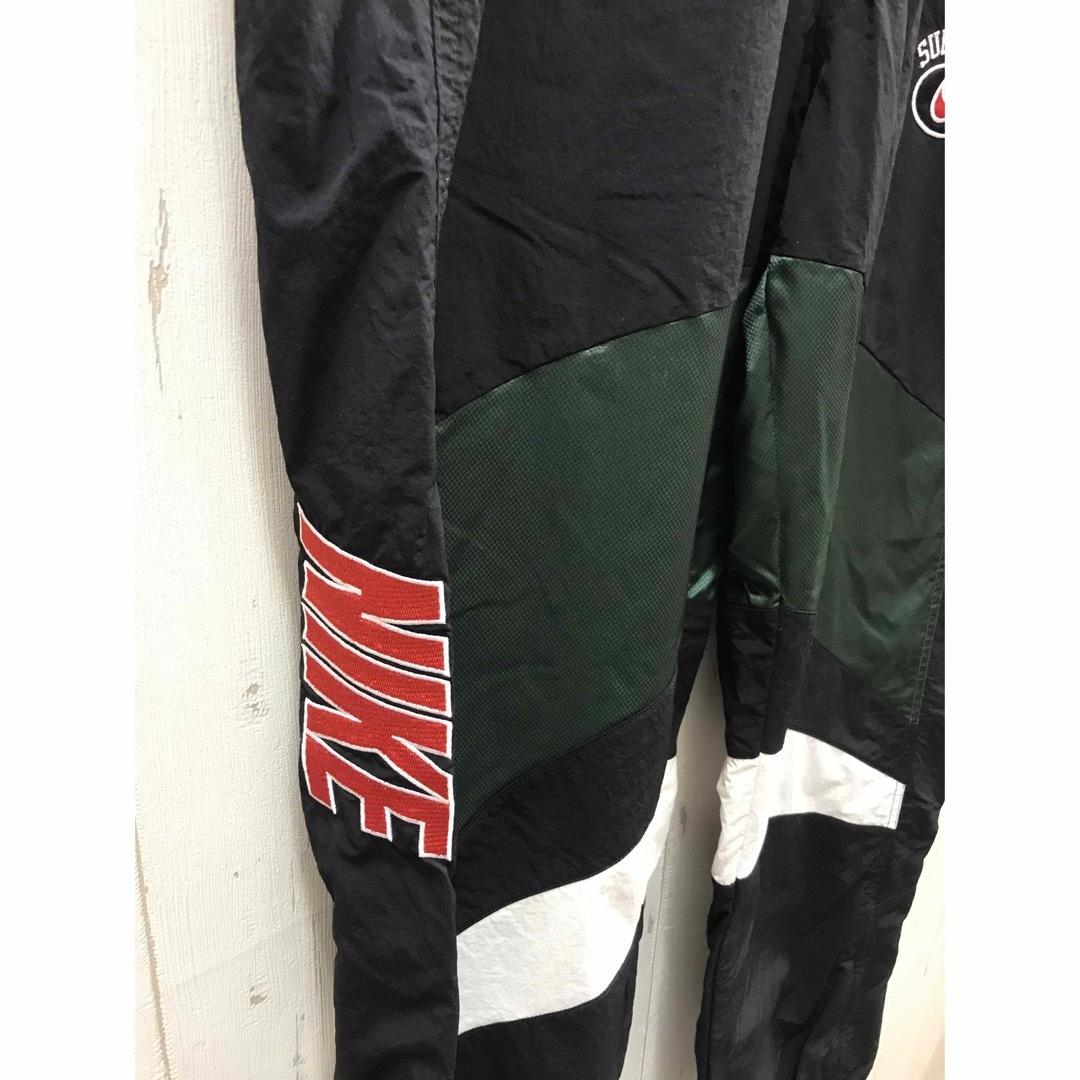 Supreme(シュプリーム)のSupreme シュプリーム × NIKE ナイキ Warm Up Pant メンズのパンツ(その他)の商品写真