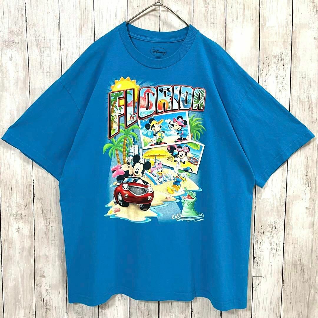 Disney(ディズニー)のアメリカ古着DISNEY FLORIDAディズニーフロリダプリントTシャツ　青 メンズのトップス(Tシャツ/カットソー(半袖/袖なし))の商品写真