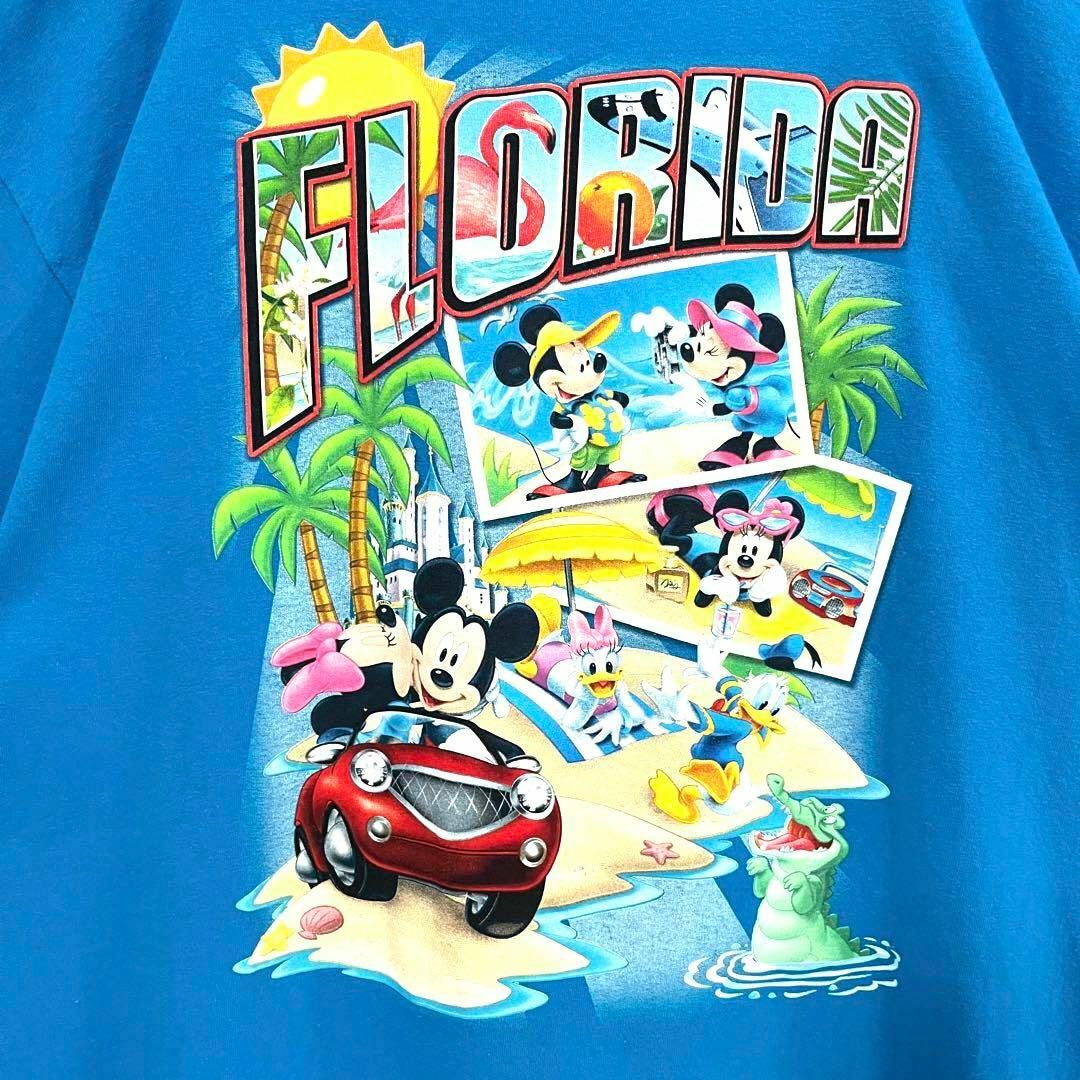 Disney(ディズニー)のアメリカ古着DISNEY FLORIDAディズニーフロリダプリントTシャツ　青 メンズのトップス(Tシャツ/カットソー(半袖/袖なし))の商品写真