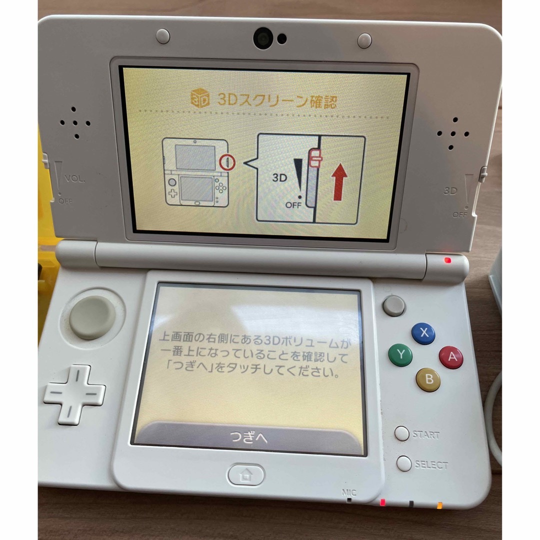 ニンテンドー3DS(ニンテンドー3DS)の3DS イエロー×ホワイト 【付属品＋ソフト7本】 エンタメ/ホビーのゲームソフト/ゲーム機本体(携帯用ゲームソフト)の商品写真