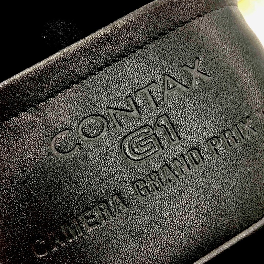 京セラ(キョウセラ)のCONTAX 限定 革レザーケース G1 カメラグランプリ受賞記念 スマホ/家電/カメラのカメラ(レンズ(単焦点))の商品写真