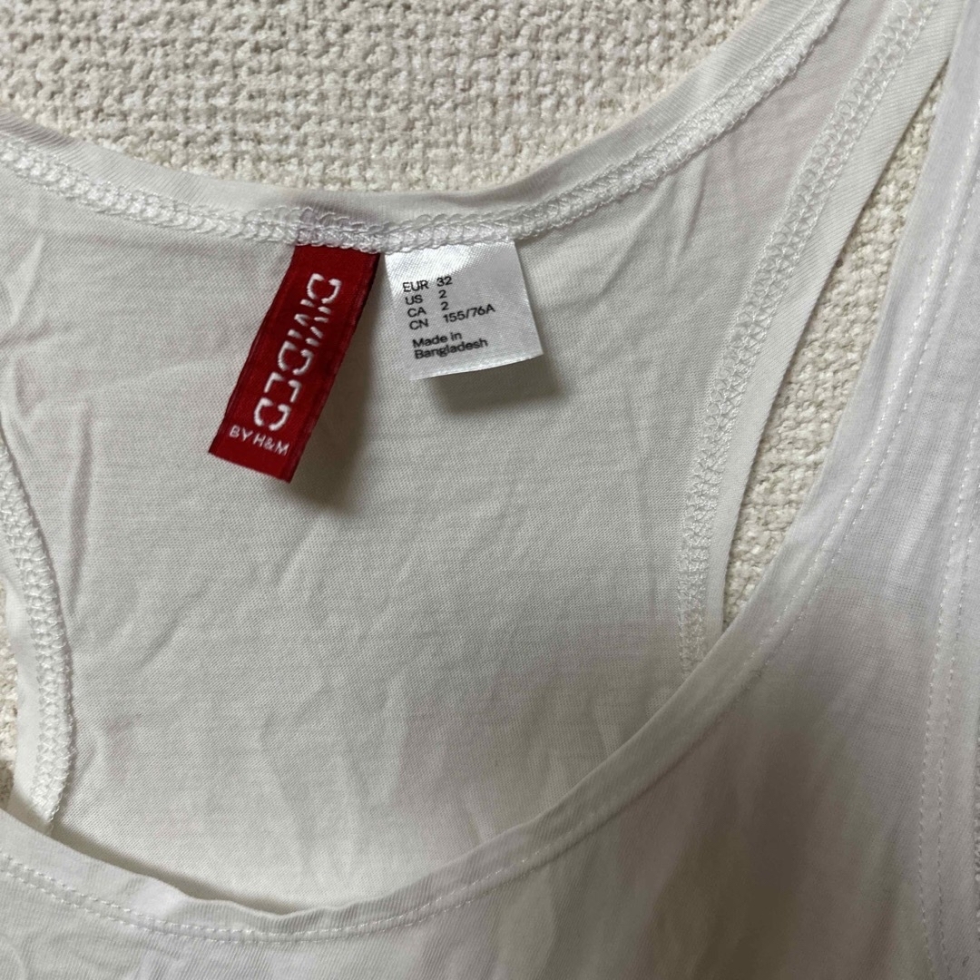 H&M(エイチアンドエム)の【未使用】H&M タンクトップ　蝶 レディースのトップス(タンクトップ)の商品写真