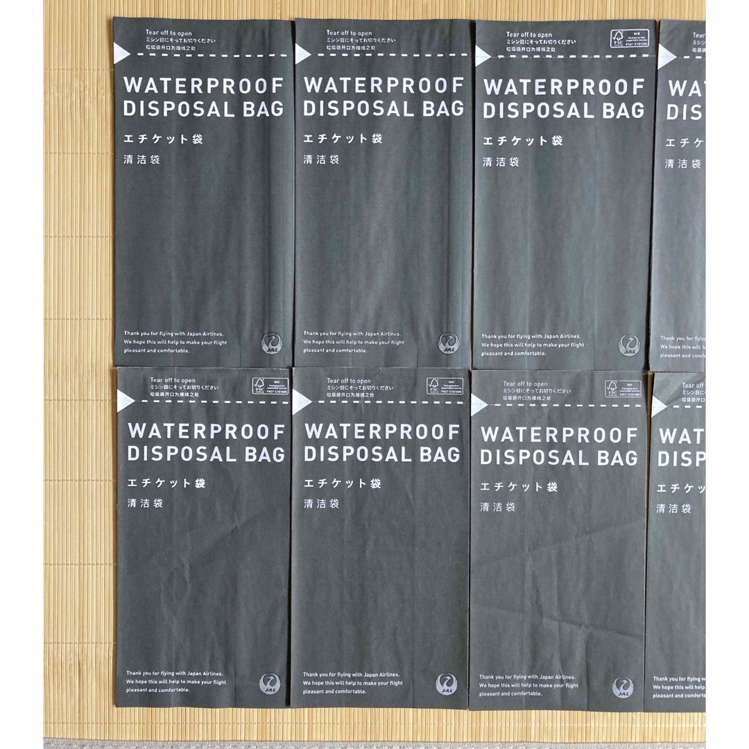 JAL(日本航空)(ジャル(ニホンコウクウ))の【未使用】JAL 日本航空　エチケット袋　10枚　防水袋　乗り物酔い インテリア/住まい/日用品の日用品/生活雑貨/旅行(日用品/生活雑貨)の商品写真