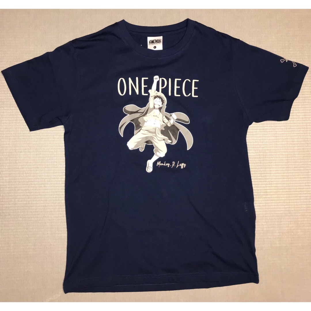 ONE PIECE(ワンピース)のメルカリ便【新品】ワンピース　ONE PIECE　ルフィ　Tシャツ　大人用　L メンズのトップス(Tシャツ/カットソー(半袖/袖なし))の商品写真