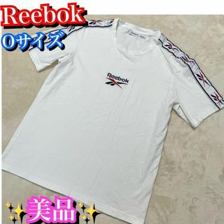 リーボック(Reebok)の美品✨Reebok リーボック　半袖シャツ　ワンテープロゴ　Oサイズ　ホワイト(Tシャツ/カットソー(半袖/袖なし))