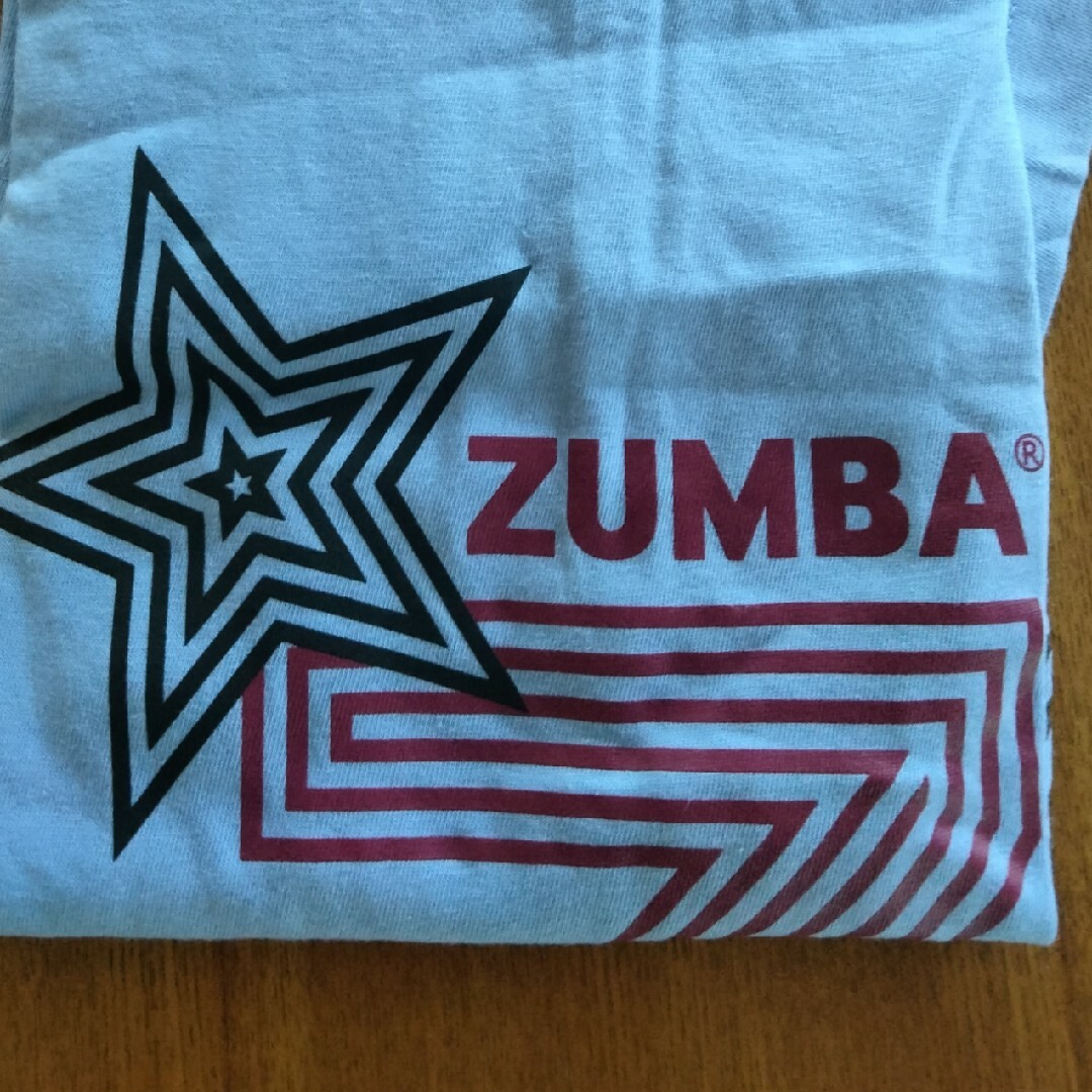 Zumba(ズンバ)の新品　ＺＵＭＢＡ  Tシャツ スポーツ/アウトドアのトレーニング/エクササイズ(トレーニング用品)の商品写真