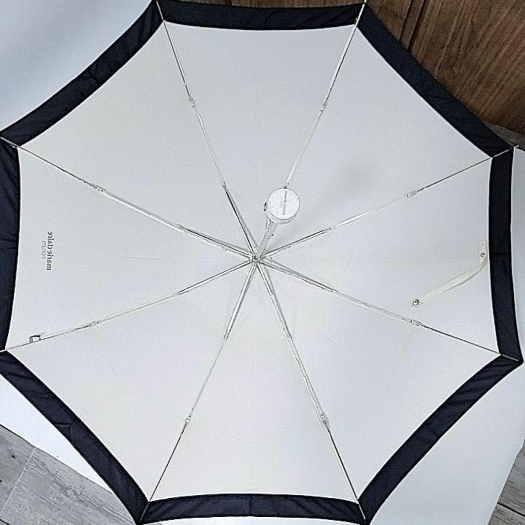 Marie Claire(マリクレール)の超美品　マリクレール　雨傘　折りたたみ　ロゴ　傘袋付き　ベージュ　ブラック レディースのファッション小物(傘)の商品写真
