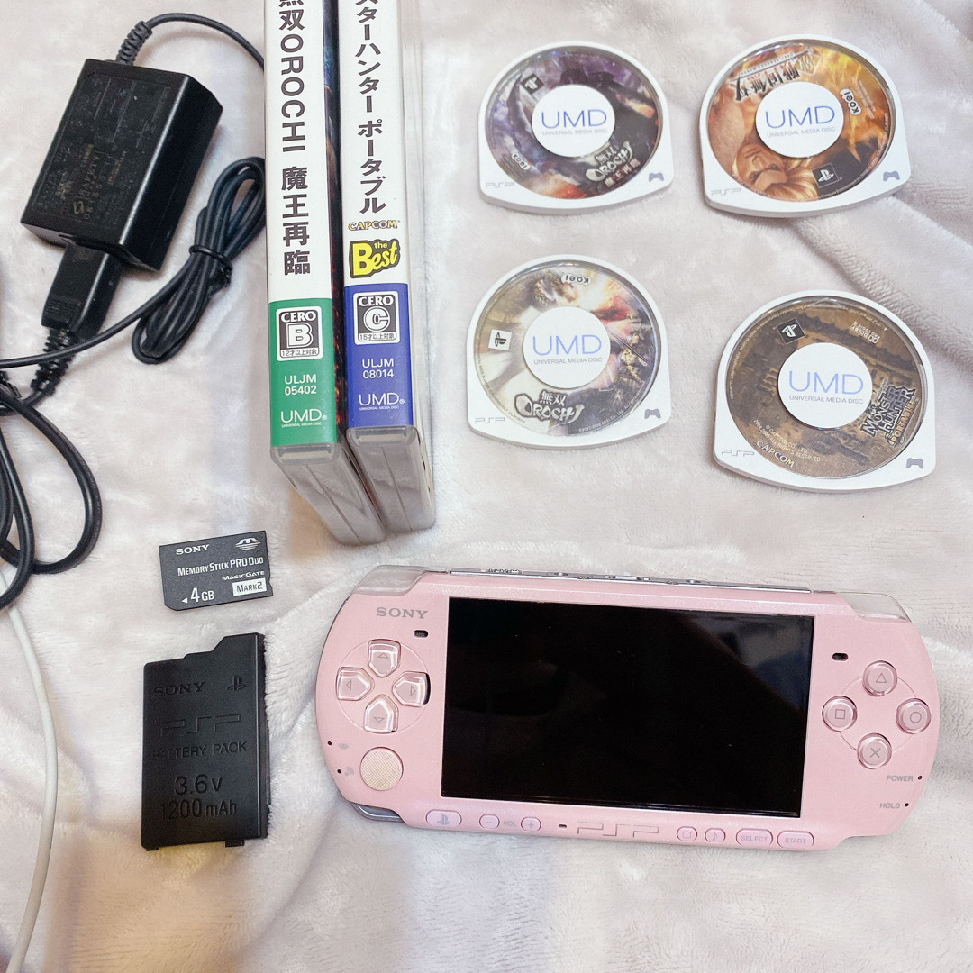 PlayStation Portable(プレイステーションポータブル)の★美品★PSP 3000 【動作確認済み】ピンク　おまけソフト付き エンタメ/ホビーのゲームソフト/ゲーム機本体(携帯用ゲーム機本体)の商品写真