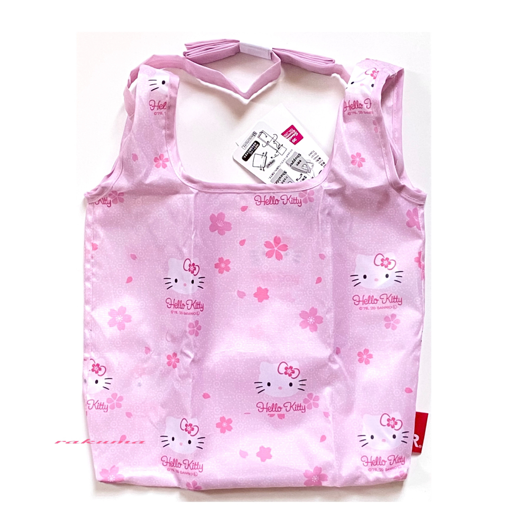 ROOTOTE(ルートート)のハローキティ　ルートート　コンパクトエコバッグ　2way 桜　新品 エンタメ/ホビーのおもちゃ/ぬいぐるみ(キャラクターグッズ)の商品写真