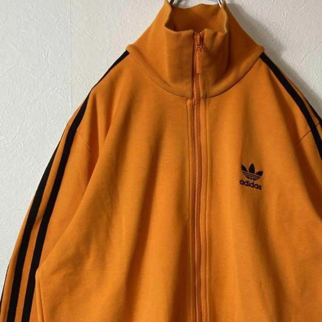 人気オレンジ、3ストライプ◎】adidasワンポイント刺繍ロゴ古着ジャージM-