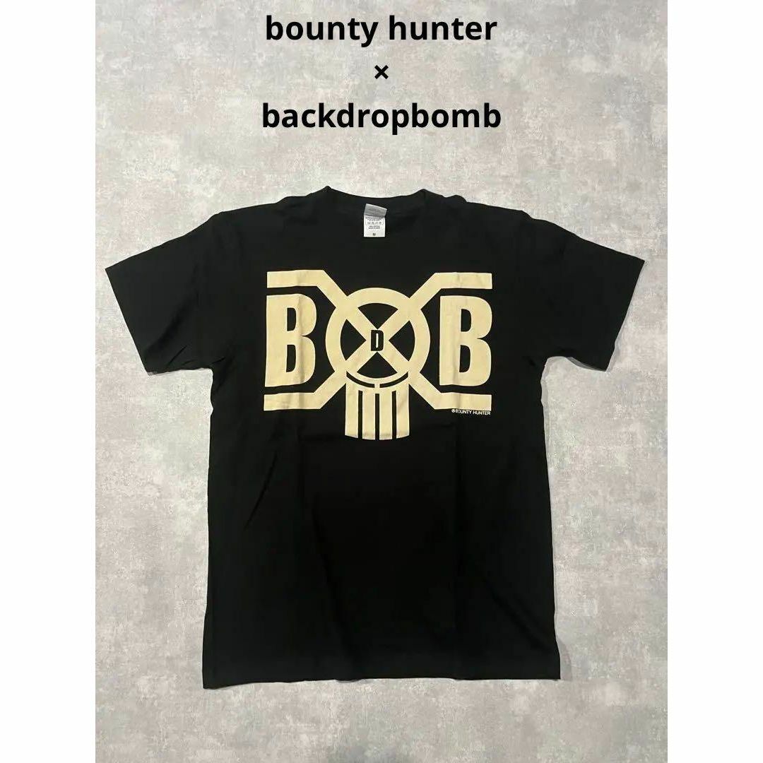 BOUNTY HUNTER(バウンティハンター)のbounty hunter backdropbomb コラボ　限定　Tシャツ メンズのトップス(Tシャツ/カットソー(半袖/袖なし))の商品写真