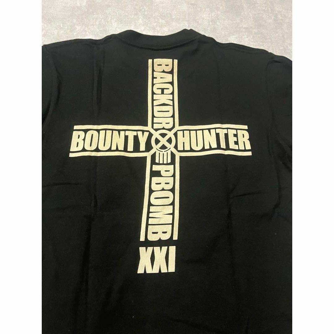 BOUNTY HUNTER(バウンティハンター)のbounty hunter backdropbomb コラボ　限定　Tシャツ メンズのトップス(Tシャツ/カットソー(半袖/袖なし))の商品写真