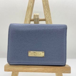 フルラ(Furla)のフルラ　三つ折り財布　ライトブルー　グレー系　レザー　ロゴ金具　レディース(財布)