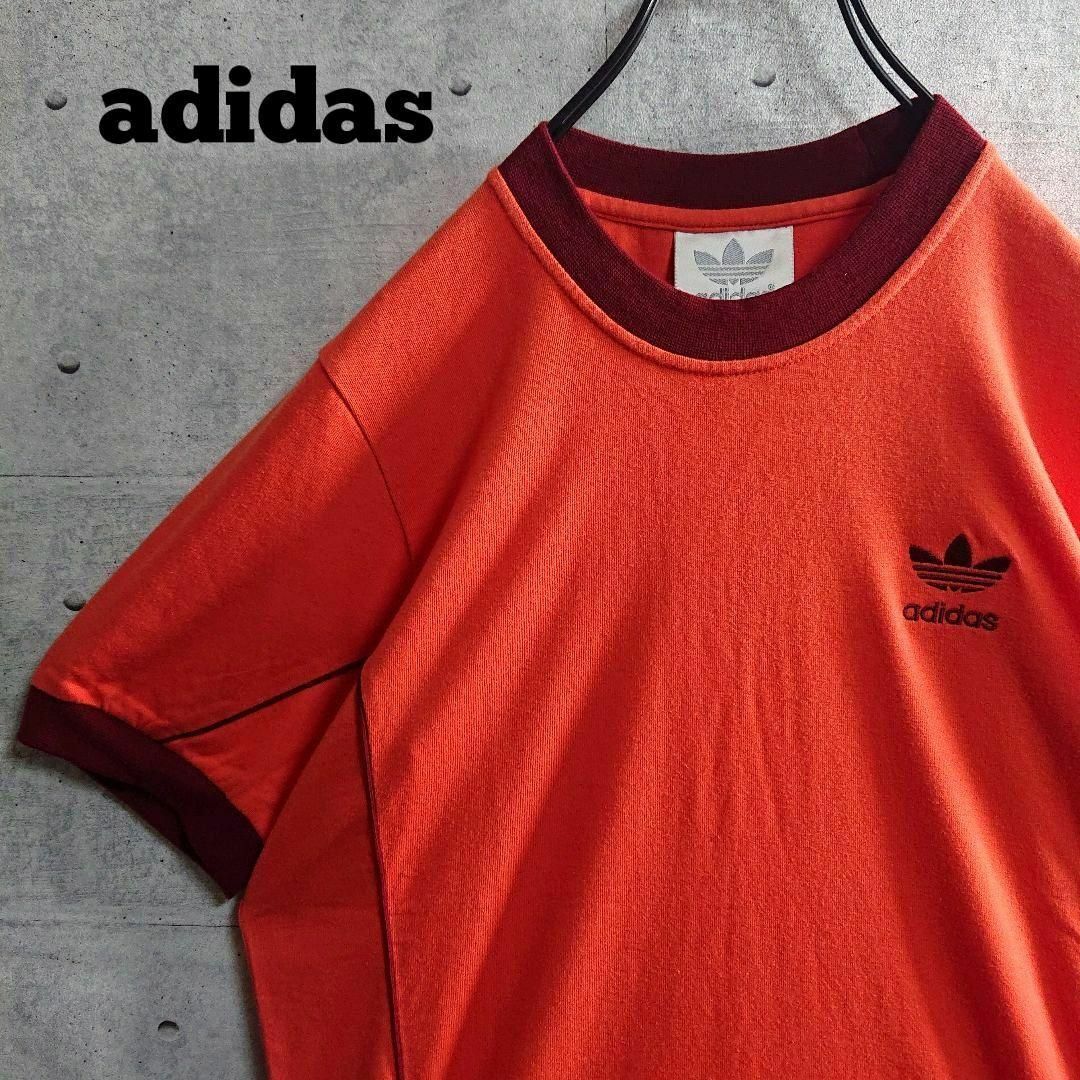 adidas(アディダス)の【アディダス】トレフォイル 刺繍ロゴ リンガーネック Tシャツ オレンジ M メンズのトップス(Tシャツ/カットソー(半袖/袖なし))の商品写真