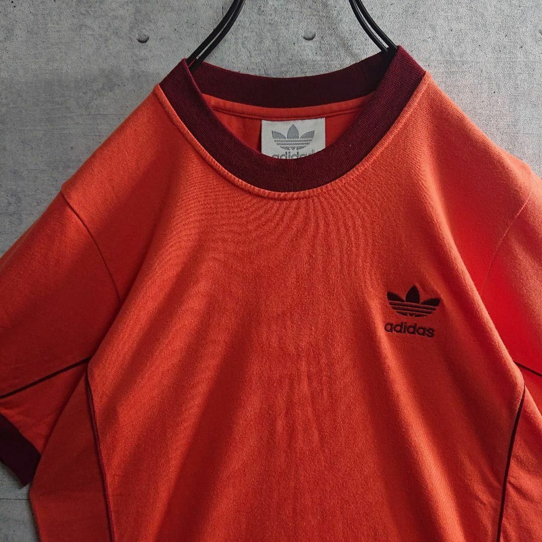 adidas(アディダス)の【アディダス】トレフォイル 刺繍ロゴ リンガーネック Tシャツ オレンジ M メンズのトップス(Tシャツ/カットソー(半袖/袖なし))の商品写真