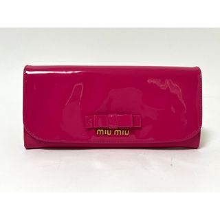 ミュウミュウ(miumiu)のミュウミュウ ２つ折り 長財布 リボン エナメル ピンク 5M1109 (財布)