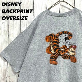 ディズニー(Disney)のアメリカ古着DISNEYディズニー　ティガーバックプリントTシャツ霜降りグレー.(Tシャツ/カットソー(半袖/袖なし))