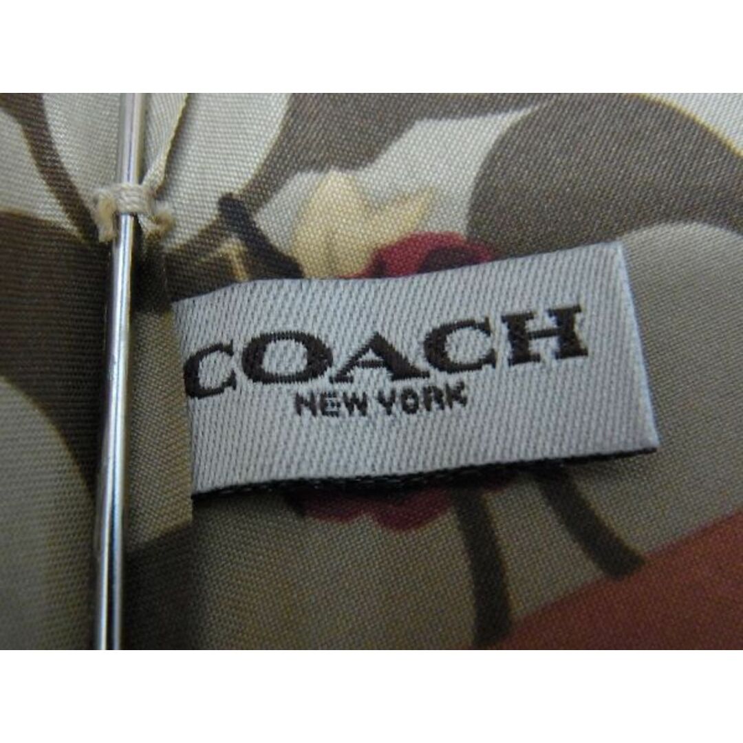 COACH(コーチ)の■新品■未使用■ COACH コーチ シグネチャー ポリエステル フラワー 3段折り 折り畳み傘 高級傘 アンブレラ 雨具 ブラウン系 BD9003 レディースのファッション小物(傘)の商品写真