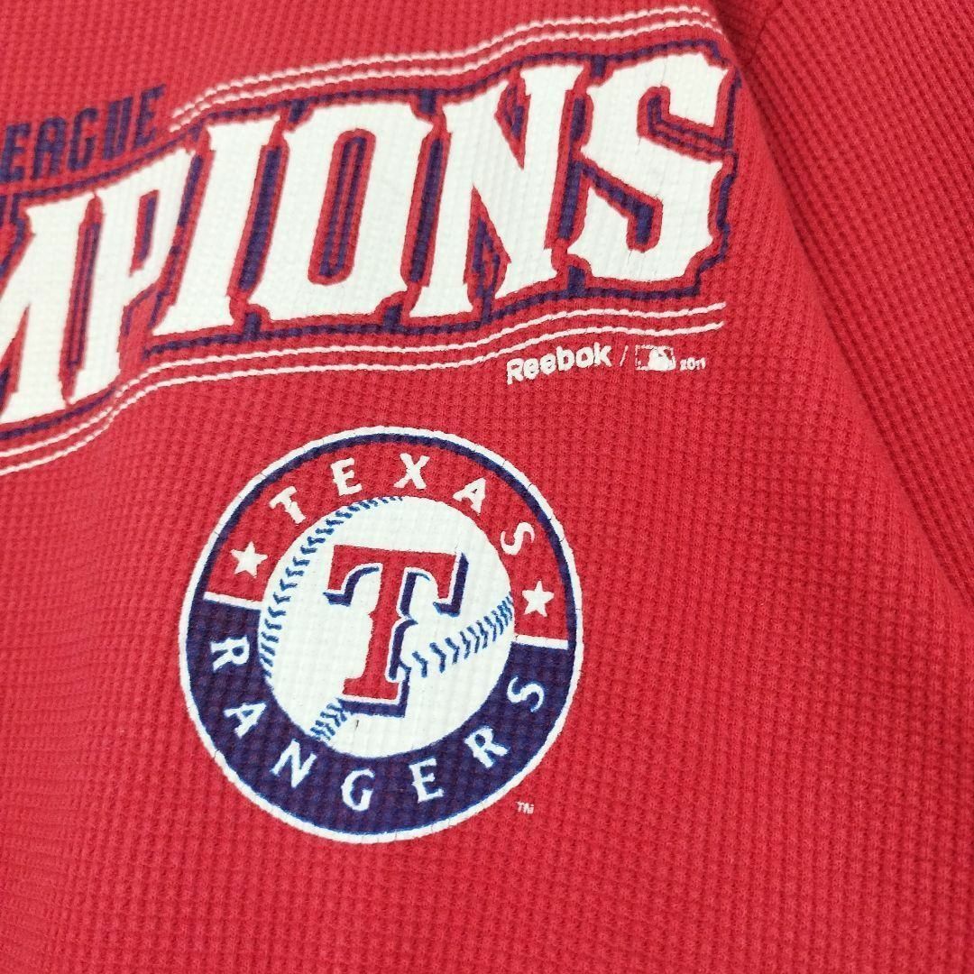 Reebok(リーボック)の激レアMLBテキサスレンジャーズ優勝記念限定ロングスリーブロンTメジャーデカロゴ メンズのトップス(スウェット)の商品写真