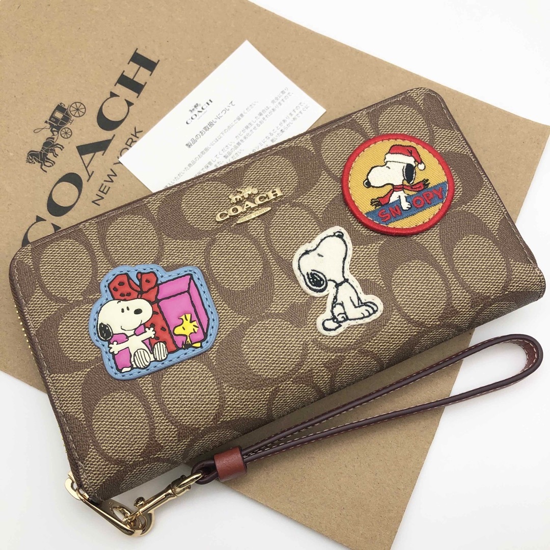 【COACH X PEANUTS】新品!スヌーピー !ウォレット☆シグネチャー | フリマアプリ ラクマ