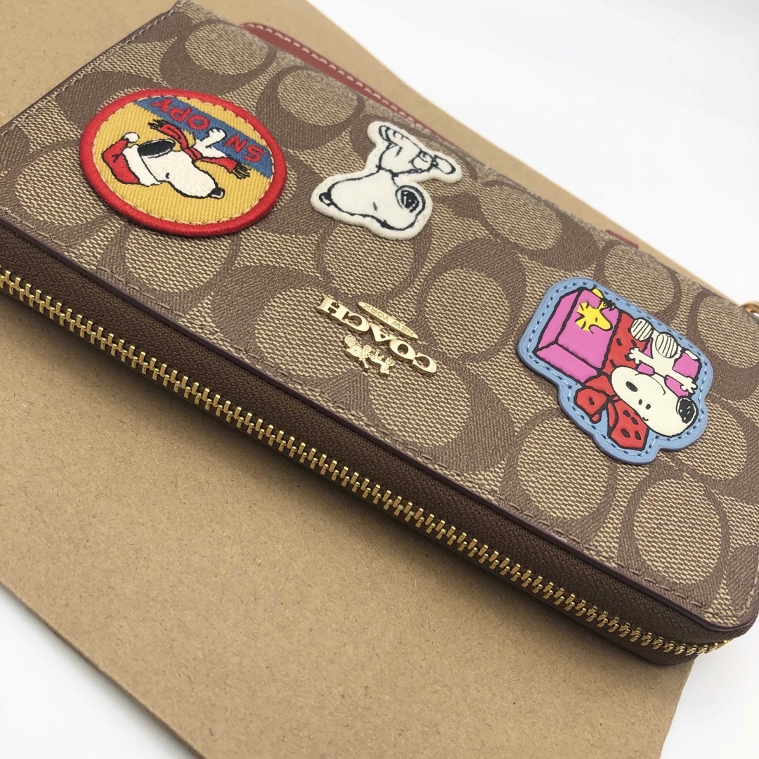 【COACH X PEANUTS】新品！スヌーピー ！ウォレット☆シグネチャー