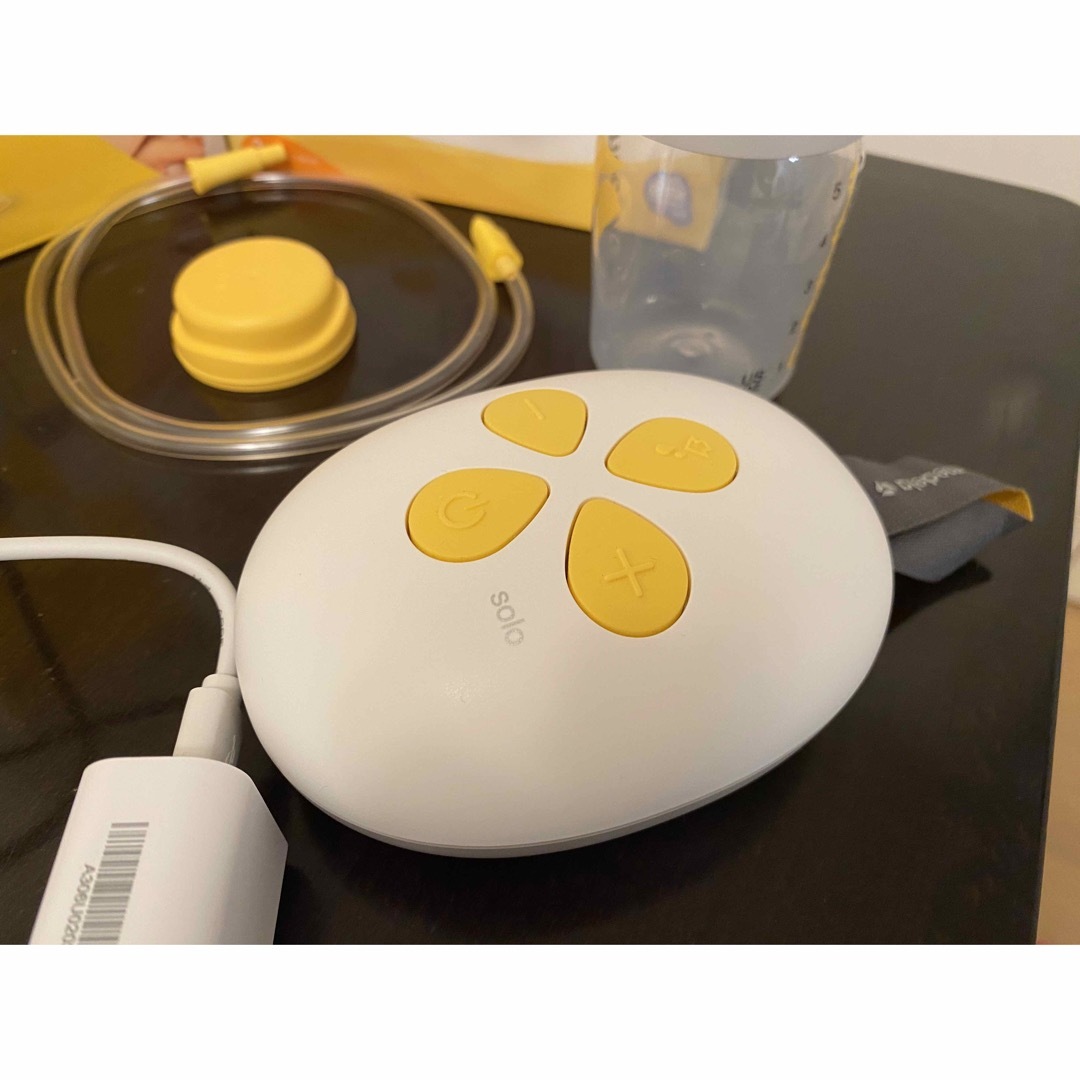 medela - メデラ ソロ電動搾乳機(本体,部品全てあり)&新品 母乳ボトル3