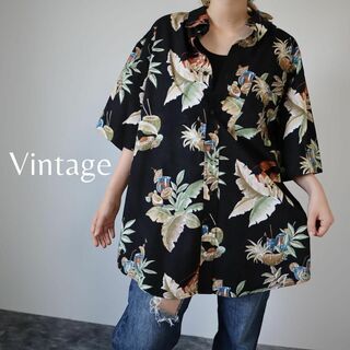 アートヴィンテージ(ART VINTAGE)の【vintage】リーフ カクテル 柄 コットン アロハ 半袖シャツ 黒 XL(シャツ)