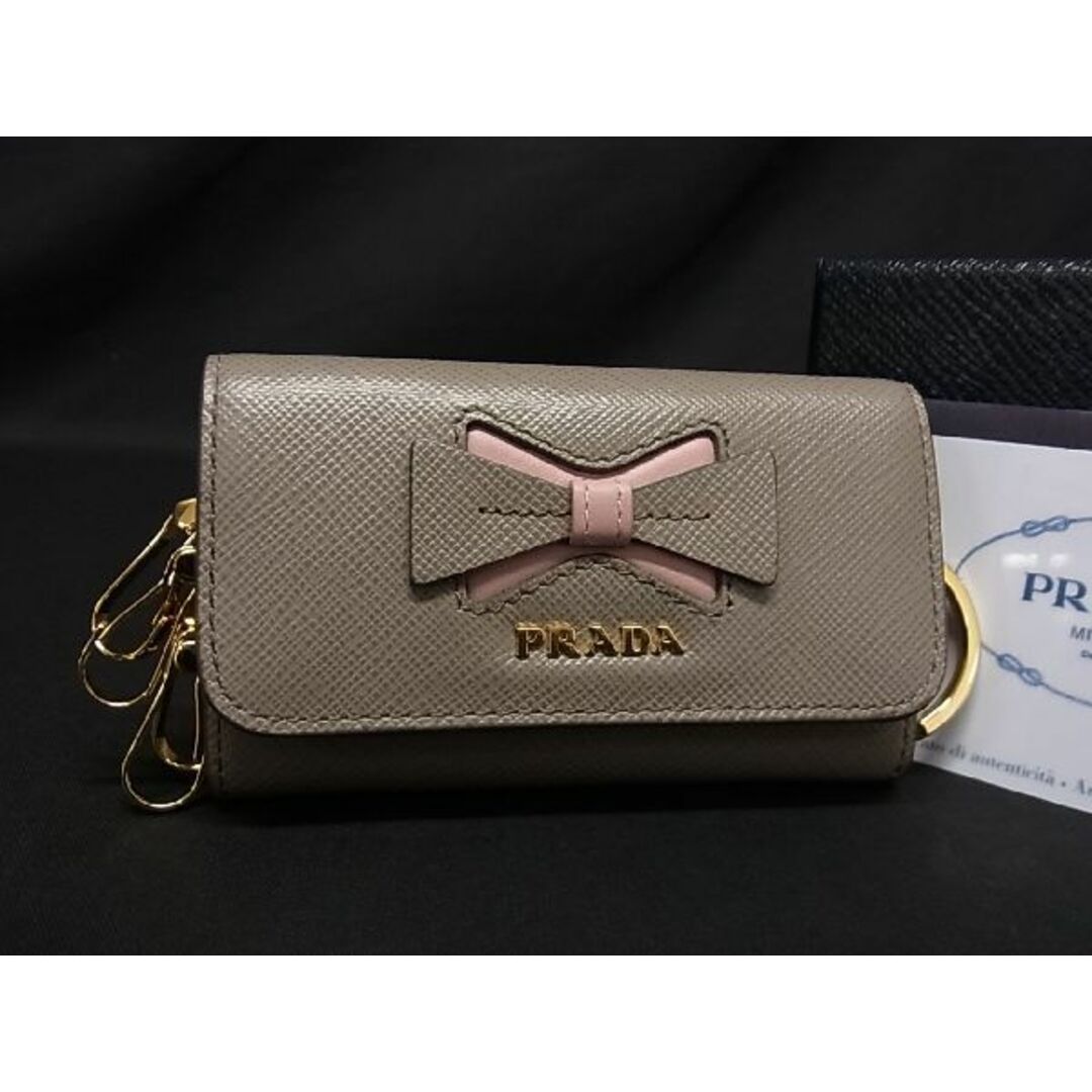 ■新品■未使用■ PRADA プラダ 1PG004 サフィアーノレザー リボン 4連 キーケース 鍵入れ キーリング レディース グレージュ系 AH8959ｵZ