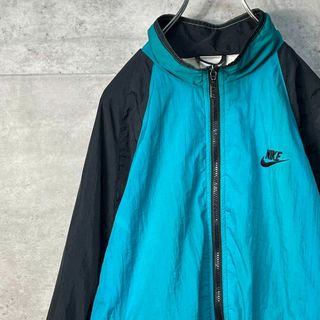 ナイキ(NIKE)の90s NIKE ナイロンジャケット ターコイズグリーン 銀タグ サイズM(ナイロンジャケット)