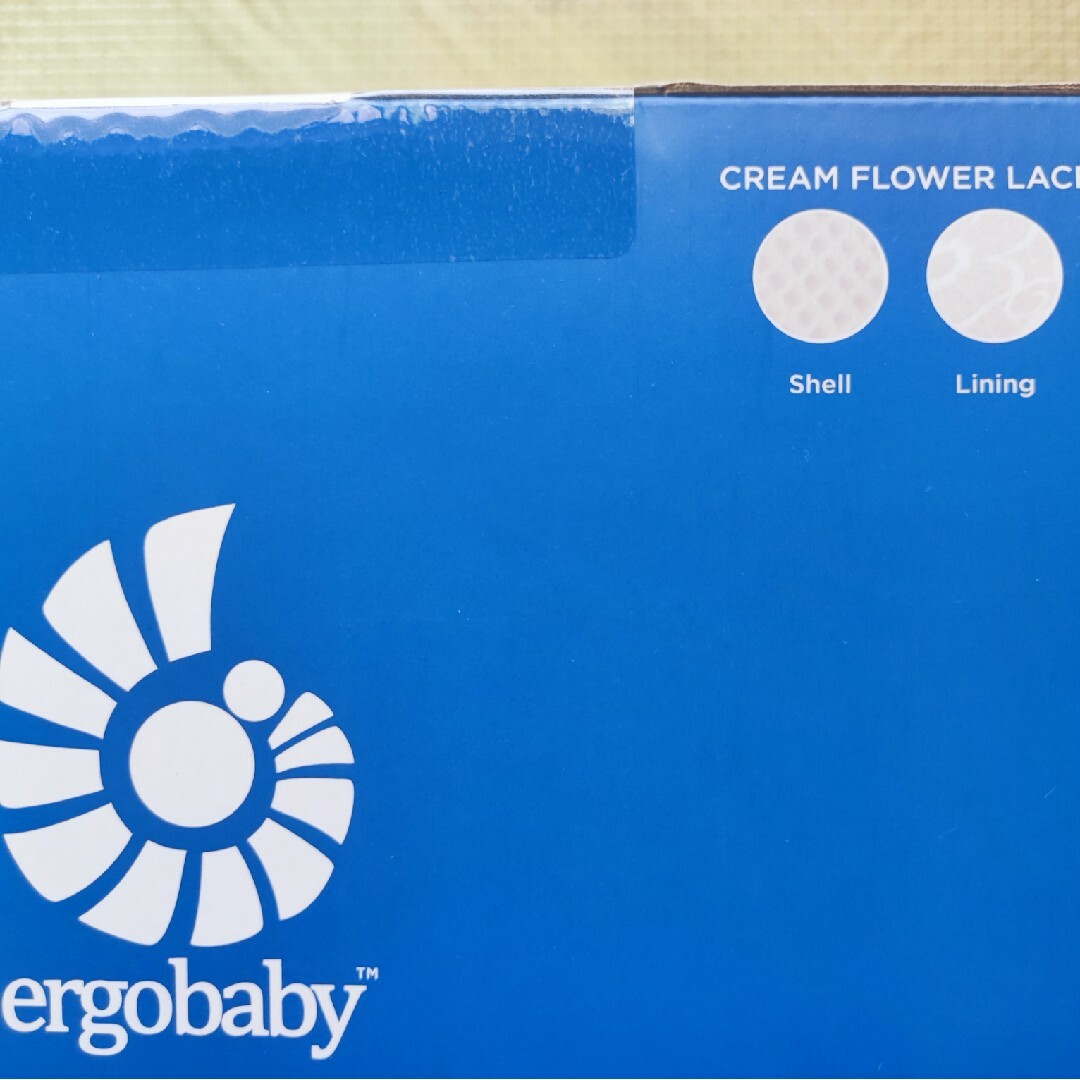 Ergobaby(エルゴベビー)のエルゴベビー　オムニブリーズ　クリームフラワーレース キッズ/ベビー/マタニティの外出/移動用品(抱っこひも/おんぶひも)の商品写真