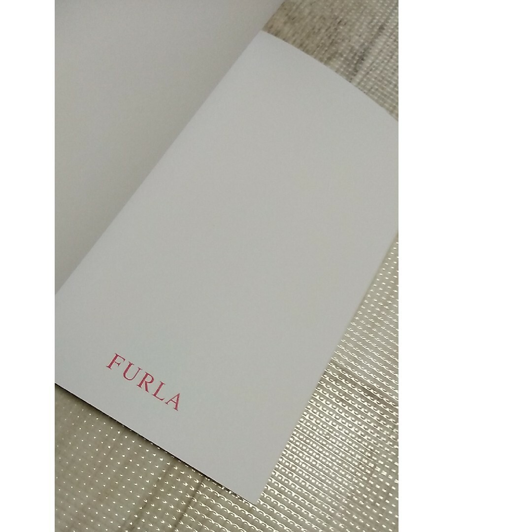 Furla(フルラ)の新品 FURLA メモ帳 インテリア/住まい/日用品の文房具(ノート/メモ帳/ふせん)の商品写真